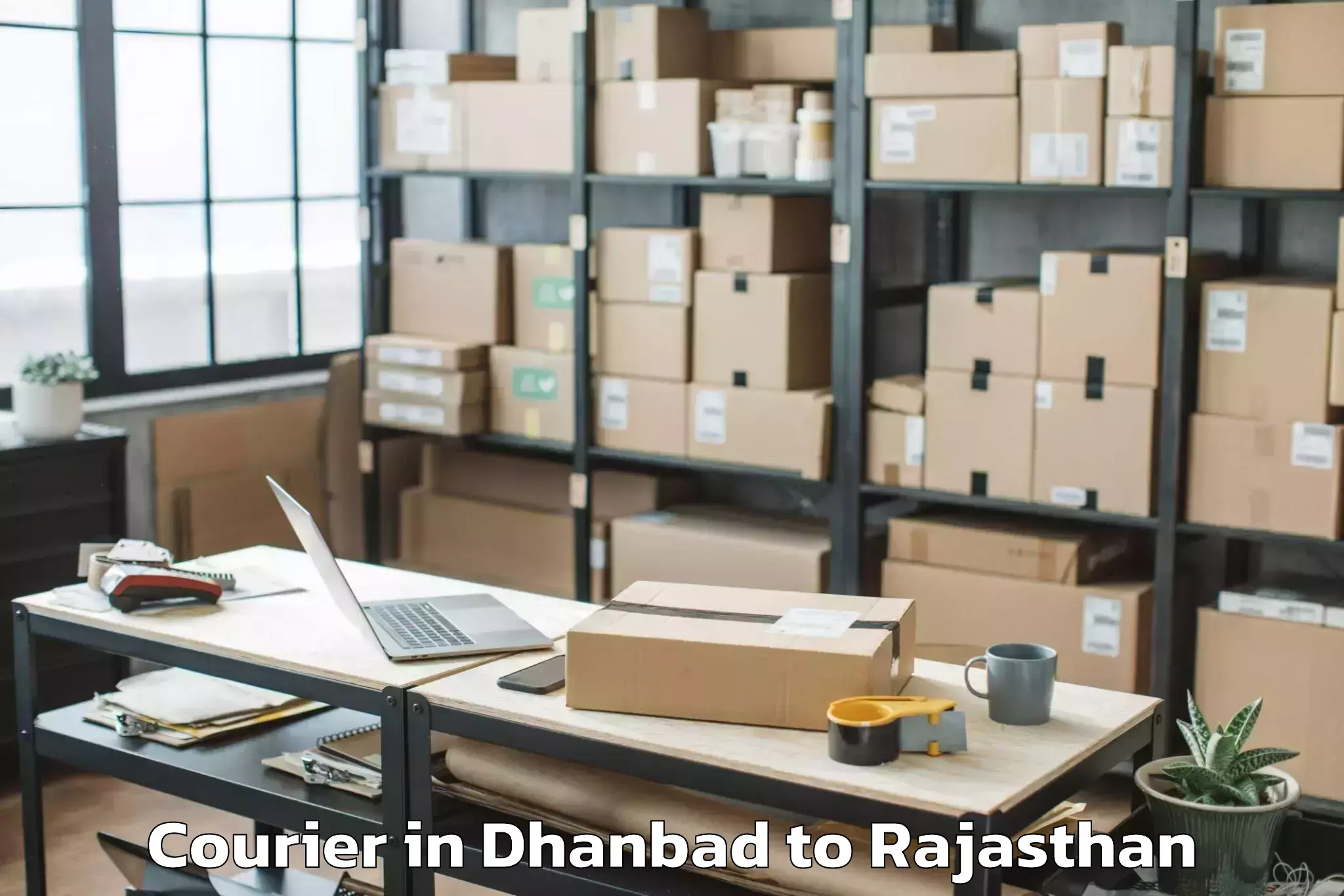 Get Dhanbad to Sangam University Bhilwara Courier